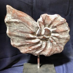 Wooden shell on stand. Solid wood